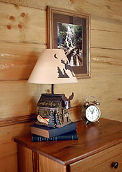 Our 2 story log cabin is decorated with a hiking camping theme and photographs of some of the local waterfalls